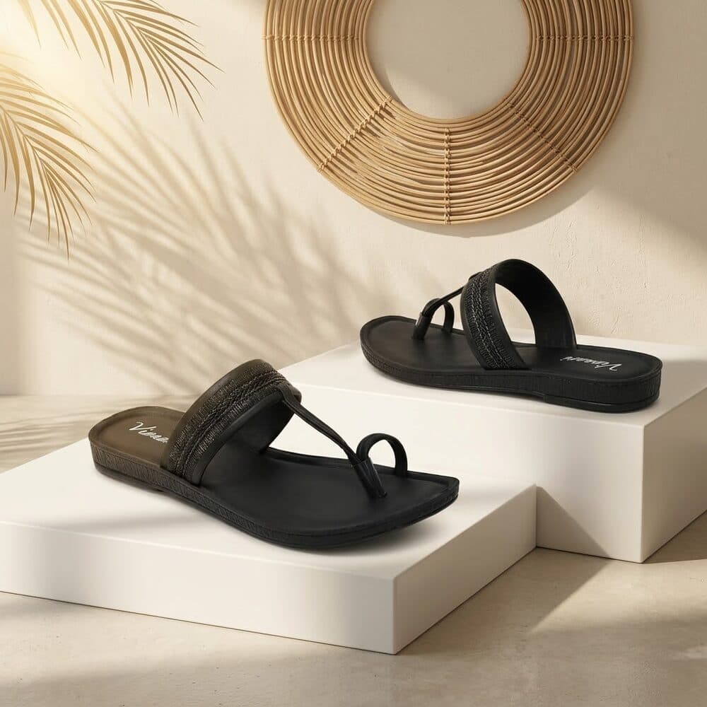 Black toe-ring flat sandal with braided strap detail