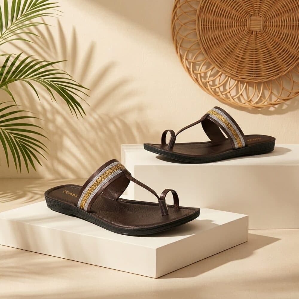 Brown toe-ring sandal with gold and silver embellished strap